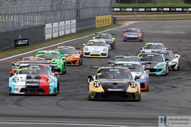 Porsche and GT field racing wheel to wheel